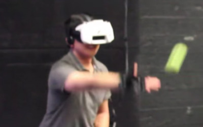 Catching a Real Ball in Virtual Reality